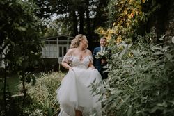 Bride and groom in garden