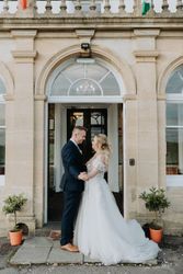 Bride and groom outside hotel