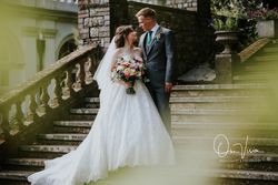 Bride and groom on steps
