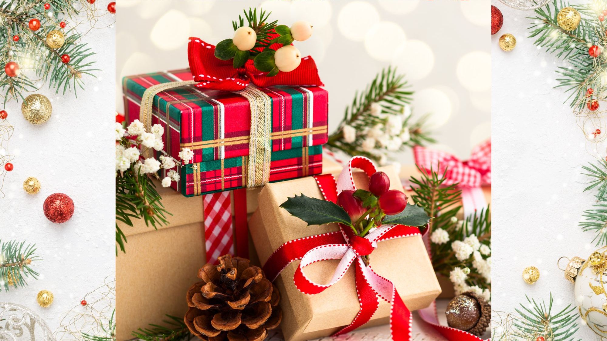 Christmas presents with festive decorations and greenery