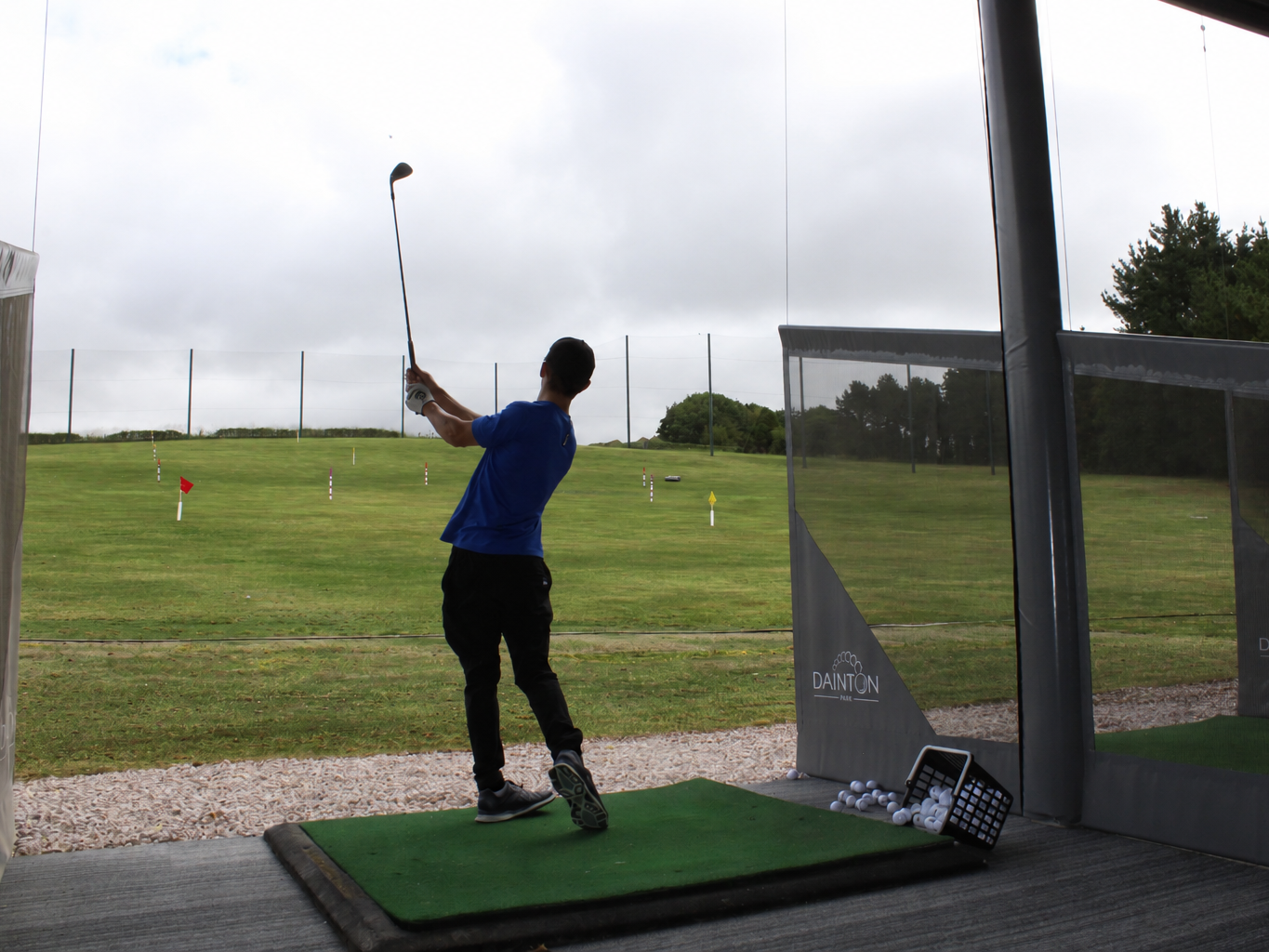 Overcast Golf Driving Range Follow-Through