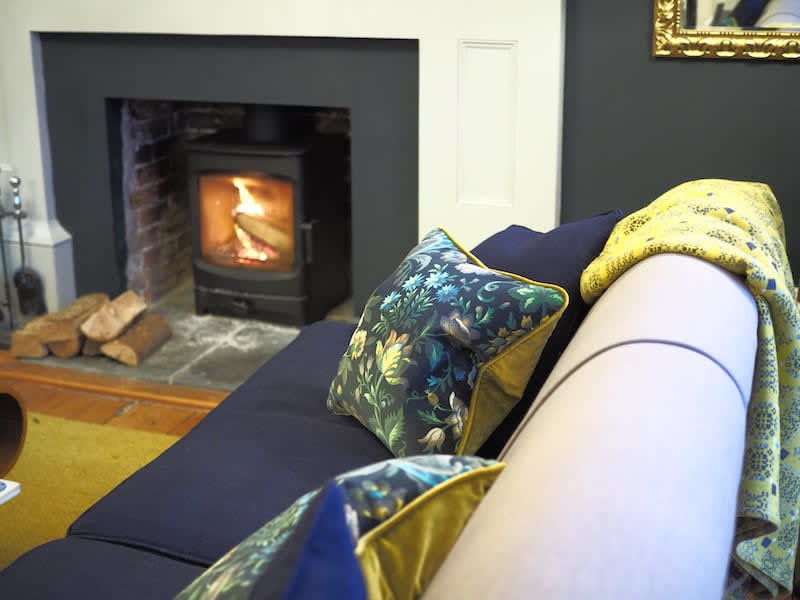 sofa and log burner