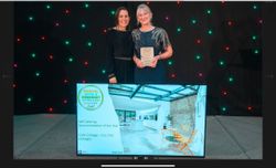 Iona picking up our Gold Award
