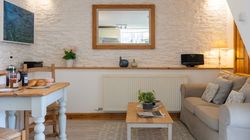 The dairy dining area and living area of the dairy