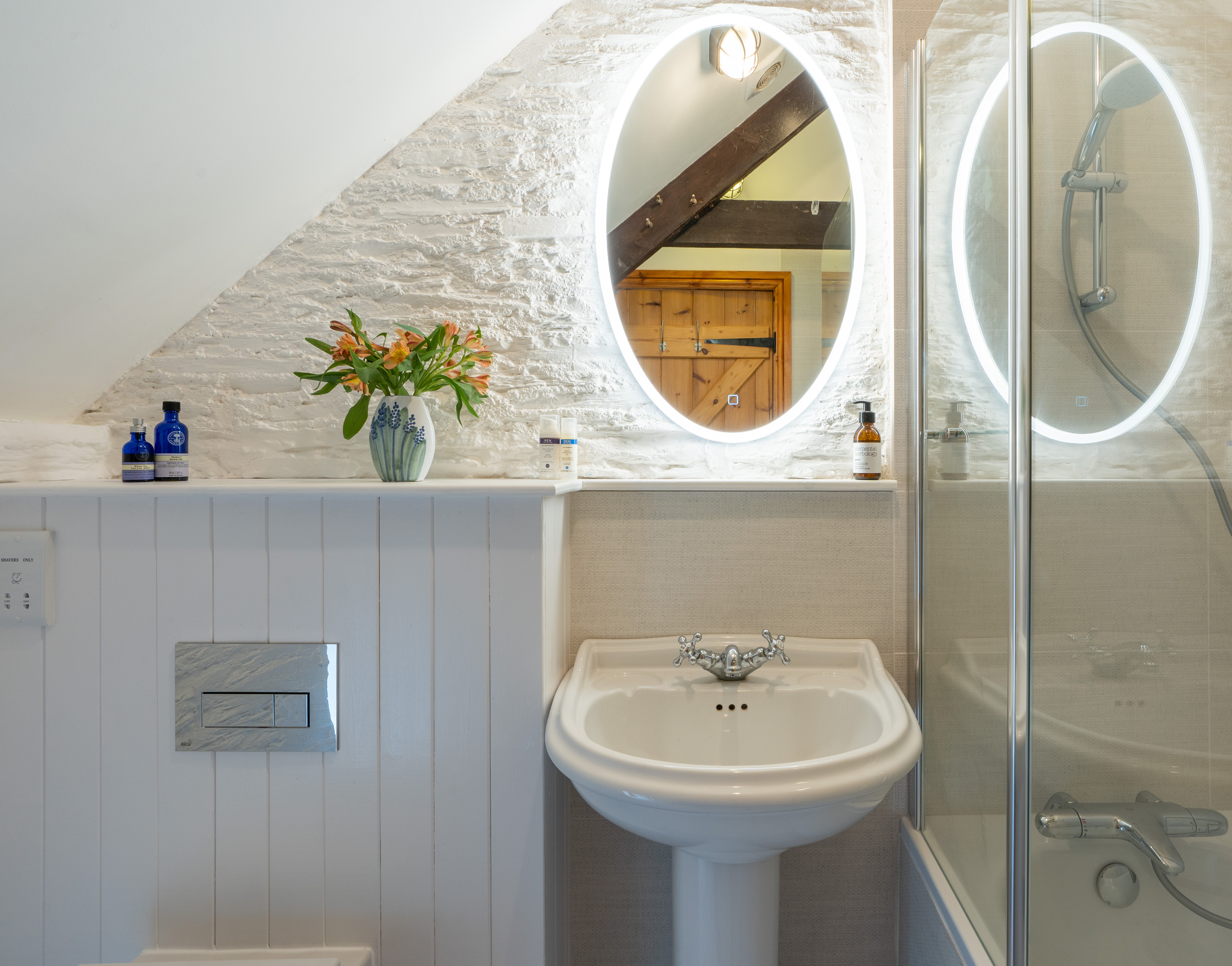 the dairy bathroom with light up mirror