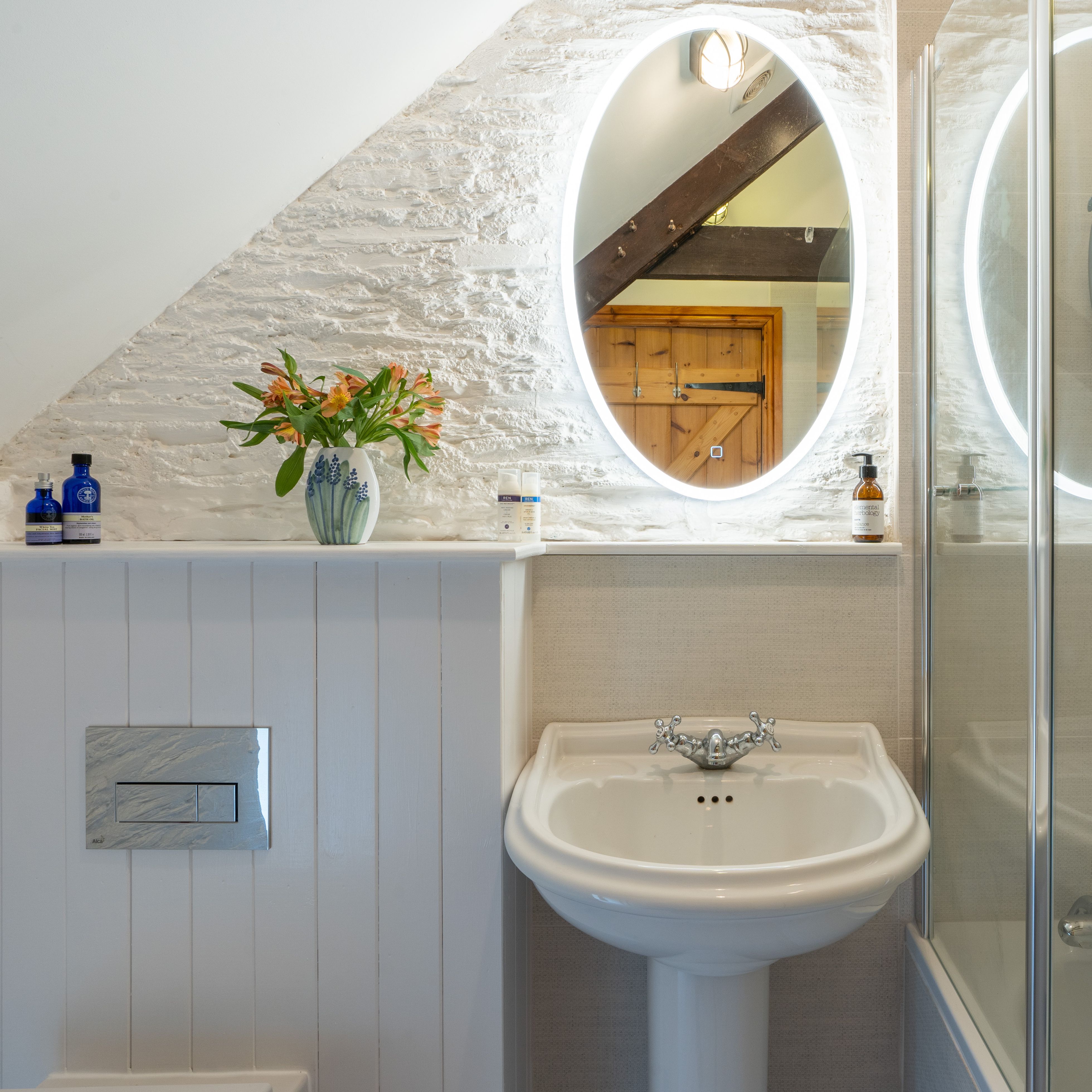 the dairy bathroom with light up mirror