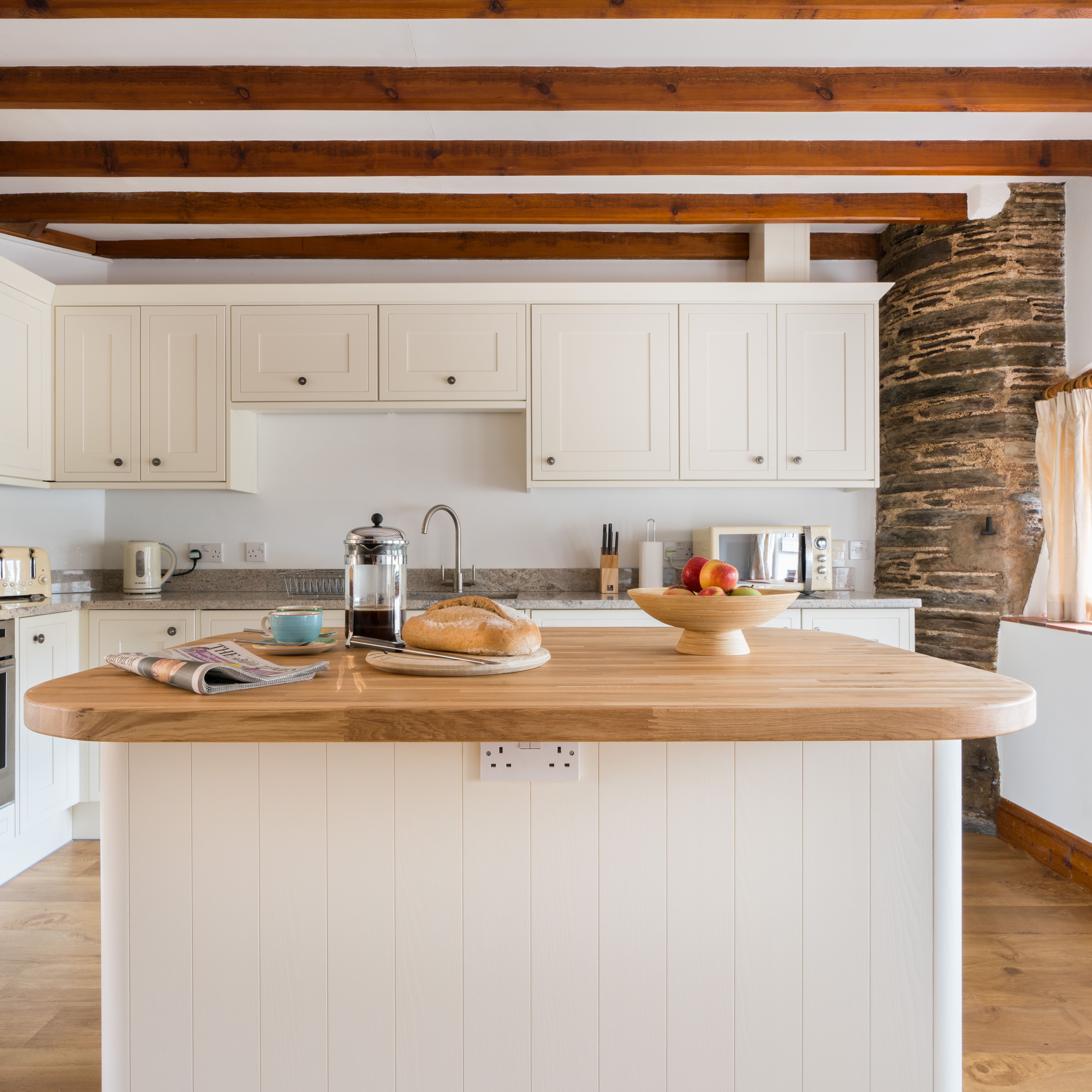 Cartwheel kitchen with exposed beams