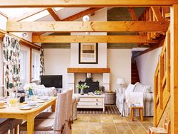 Linhay living area with exposed beams