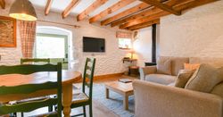 Quarry living area with exposed beams