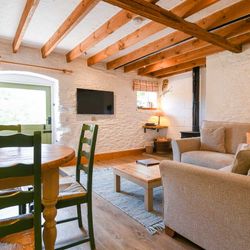 Quarry living area with exposed beams
