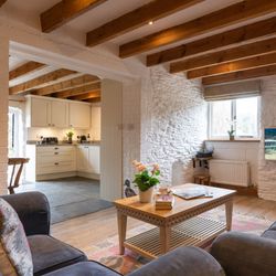 Ducks Nest living area with two sofas and open plan into the kitchen