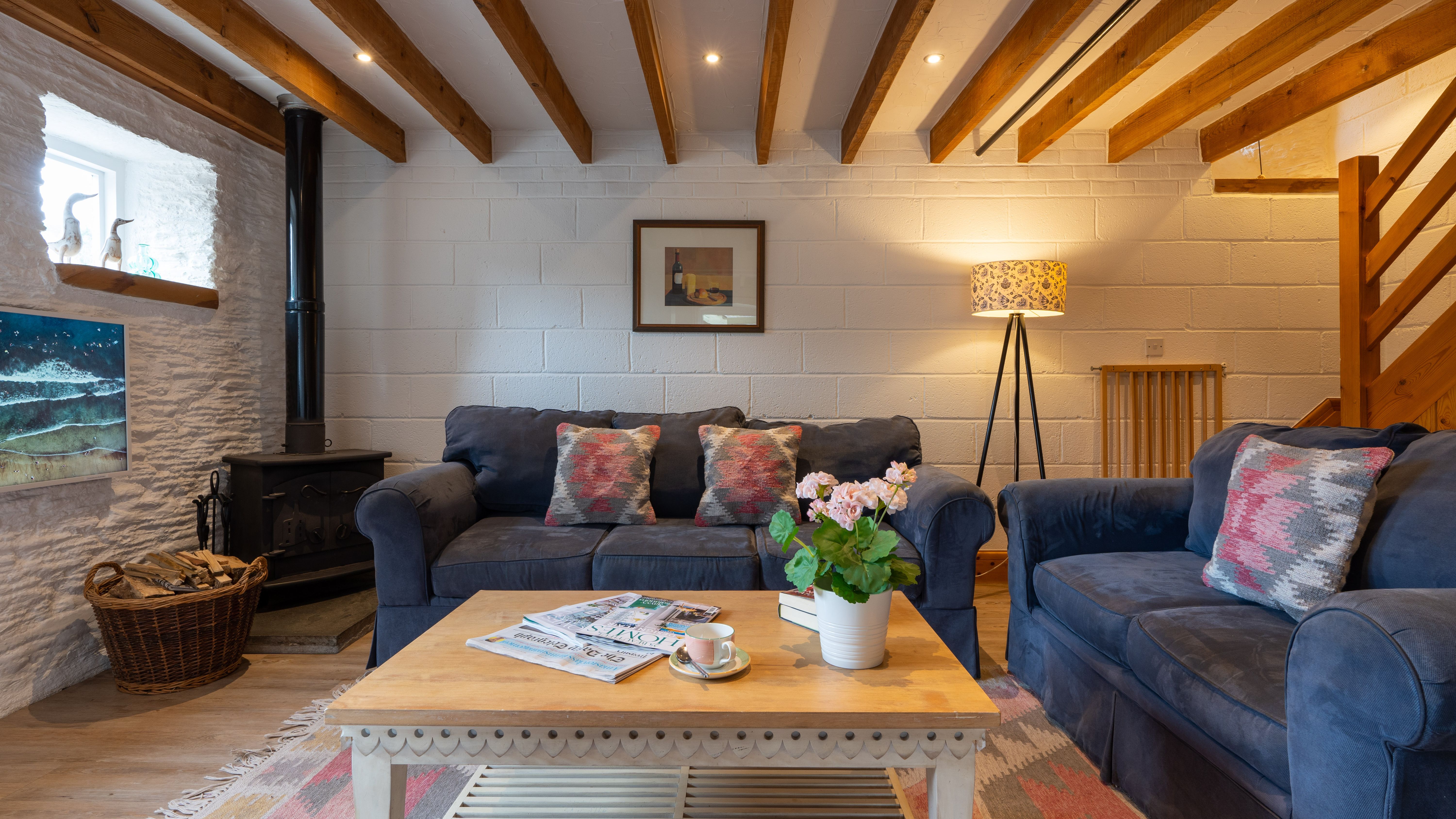 Ducks Nest living room with two sofas and exposed beams