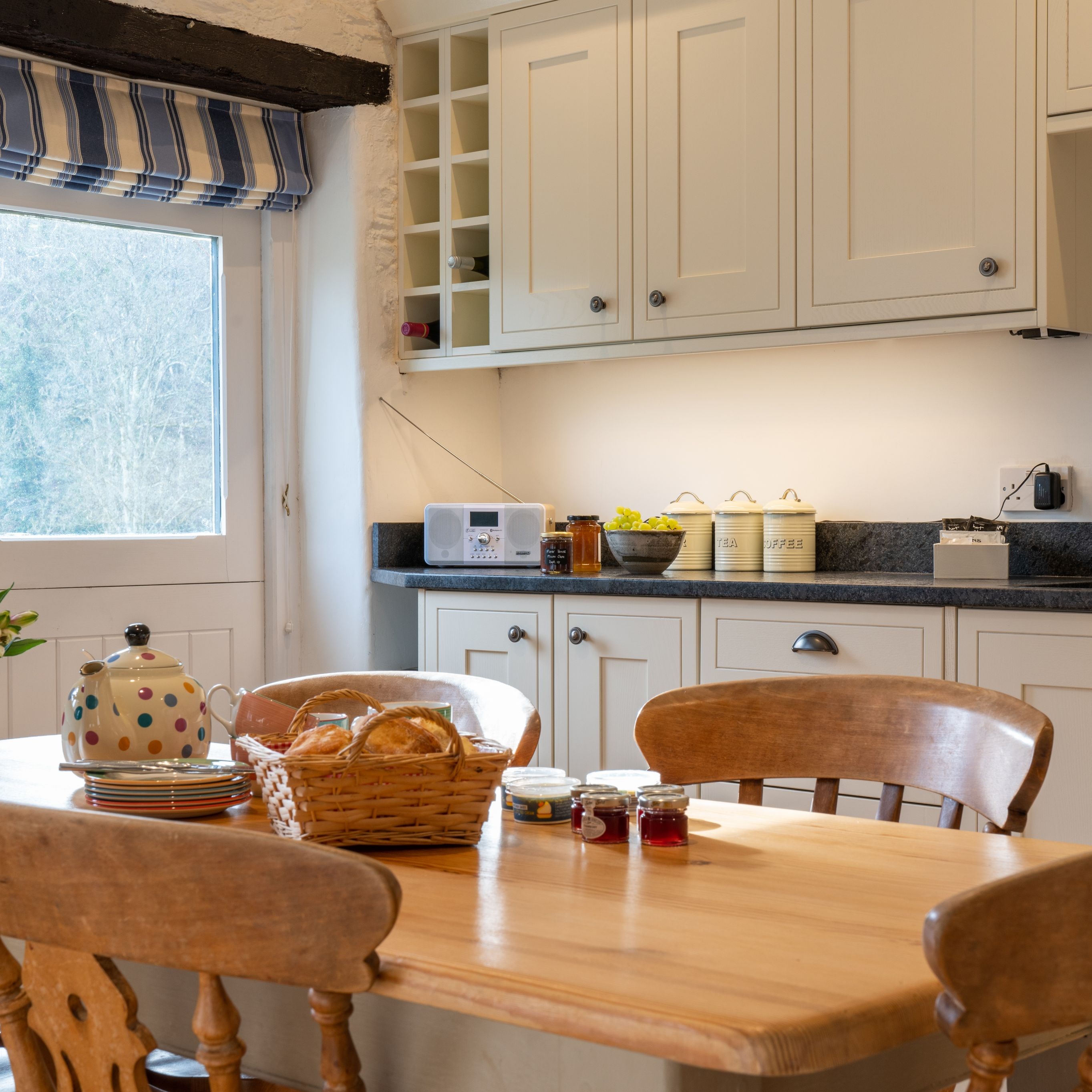 the stables dining table and kitchen