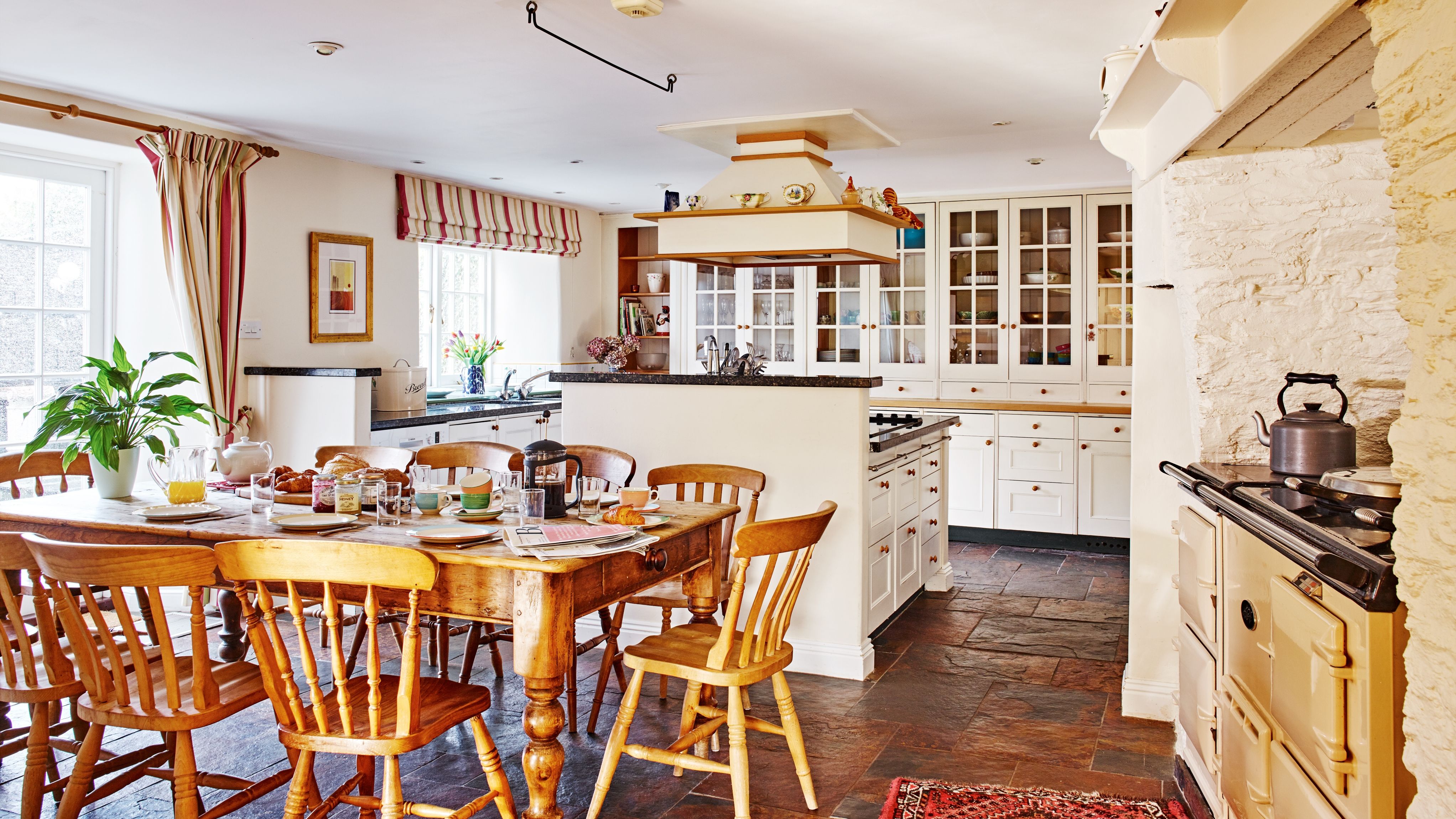Dining table looking into kitchen