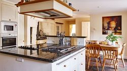Modern kitchen looking into dining area