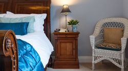 Traditional double bed with blue cover
