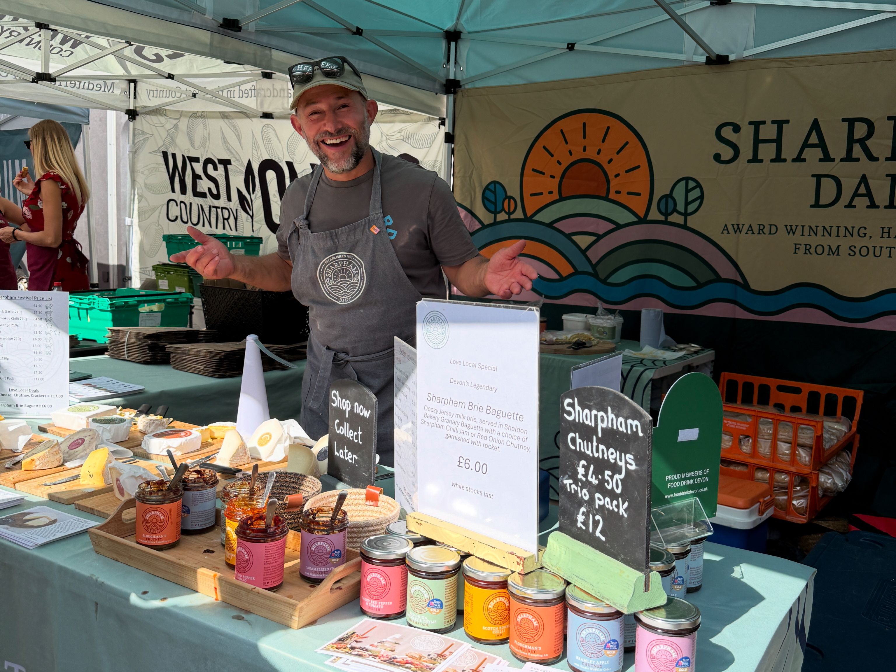 Greg of Sharpham Cheese on his stand surrounded by cheese and chutney at the Love Local Festival Exeter