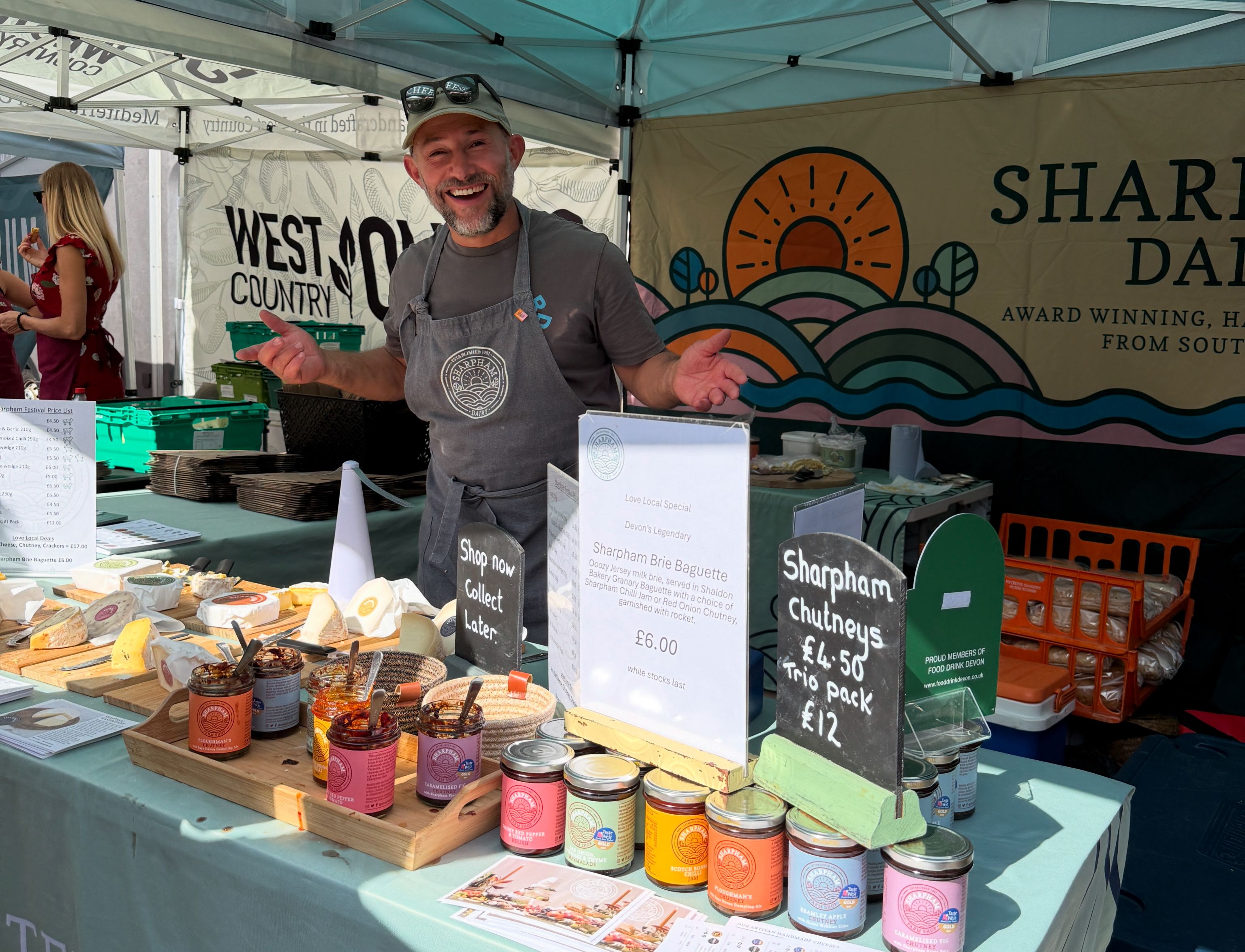 Greg of Sharpham Cheese on his stand surrounded by cheese and chutney at the Love Local Festival Exeter