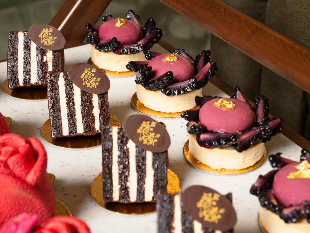 Tow rows of delicious looking cakes from Boringdon Hall's Sense and Sensibility Afternoon tea