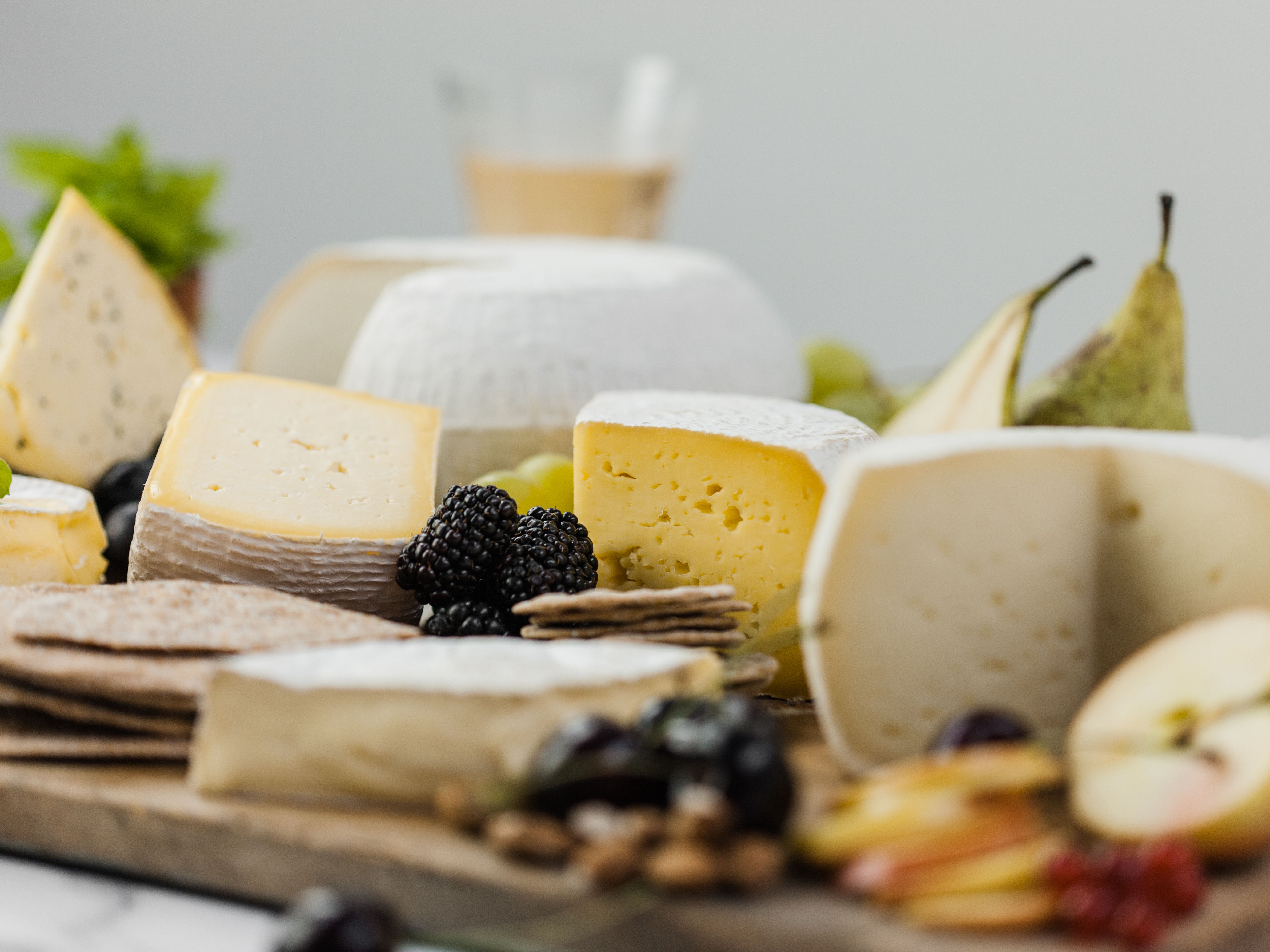 Sharpham Cheese board with fruit, wine and crackers