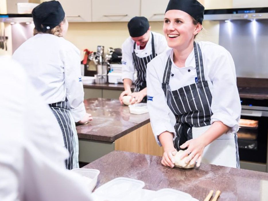 Ashburton Cookery School chefs in kitchen