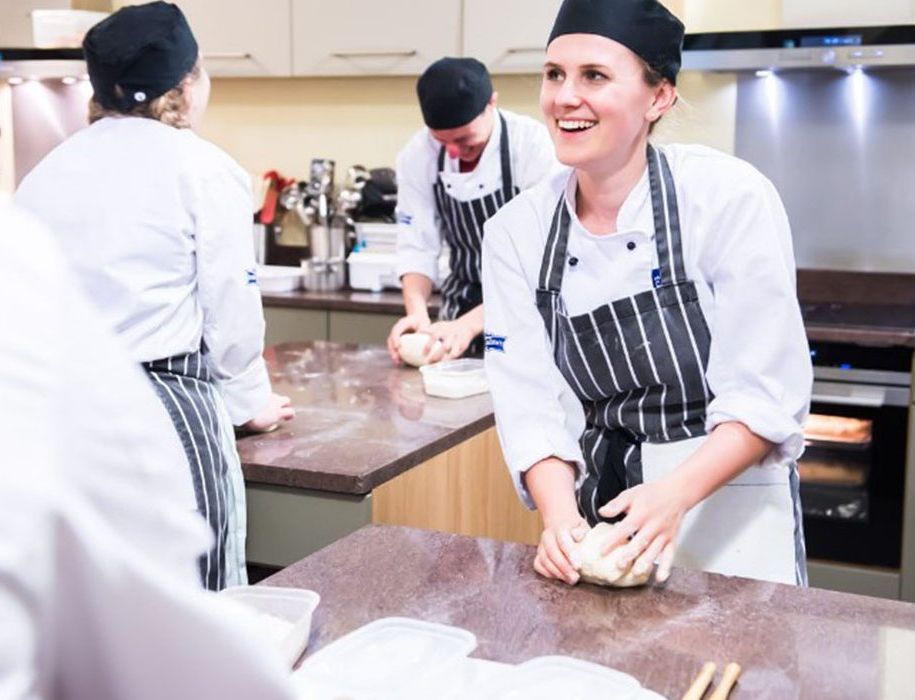 Ashburton Cookery School chefs in kitchen