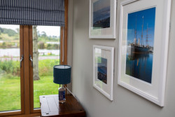 Harris tweed lamp and pictures on wall