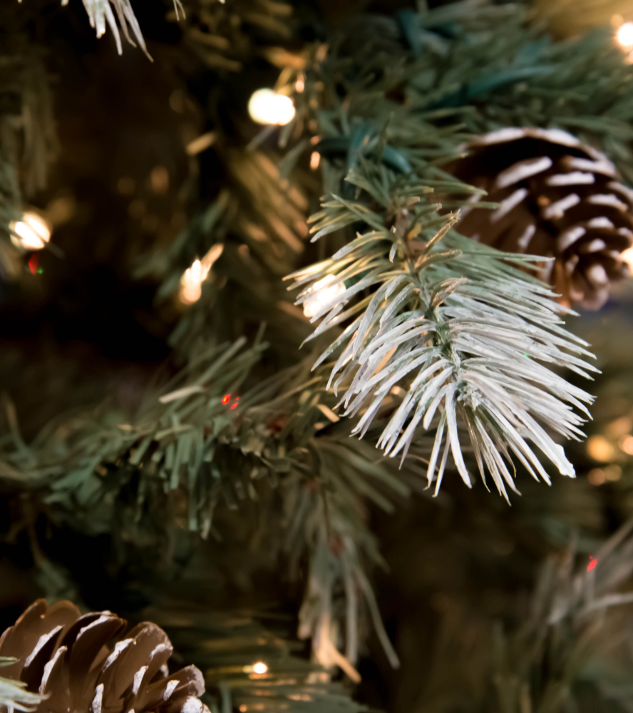 Glittering lights on a rustic Christmas tree.