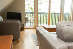 Sofa and tv in Glen Shee living area