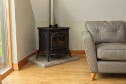 Wood burner and sofa
