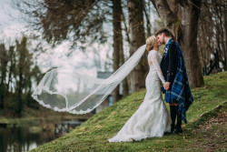 Bride and groom in woods