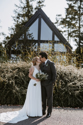 Bride and groom outside Buddon Burn building