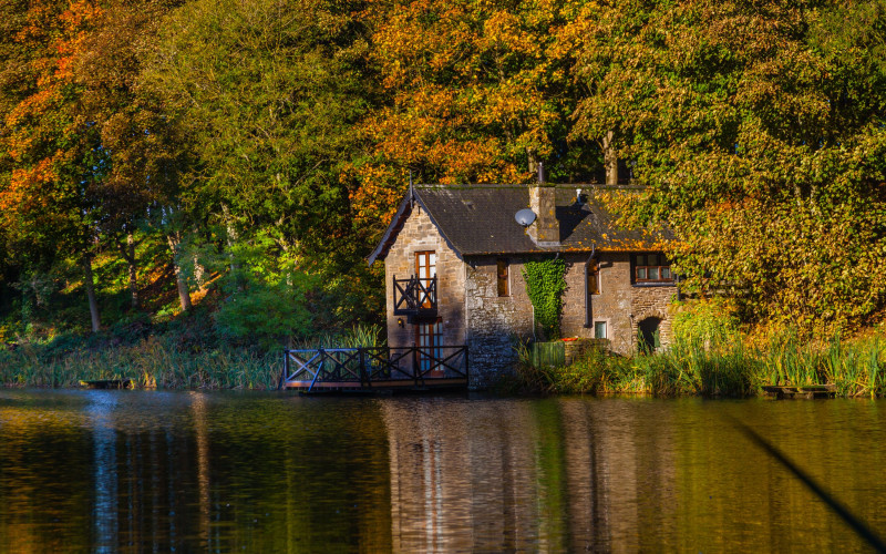 Boathouse across fishing pond