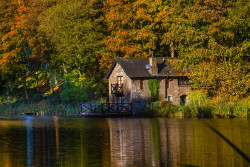 Boathouse across fishing pond