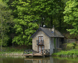 Boathouse across fishing pond