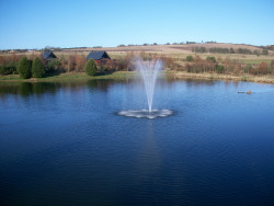 Fountain in fishing pond