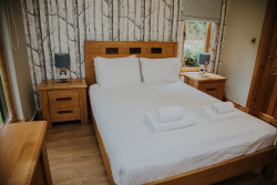 Double bed in Glen Lyon lodge