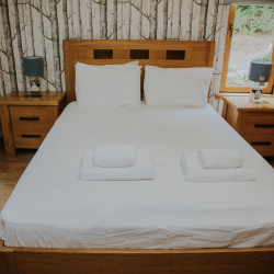 Double bed in Glen Lyon lodge