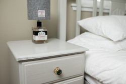 Harris tweed lamp on bedside table
