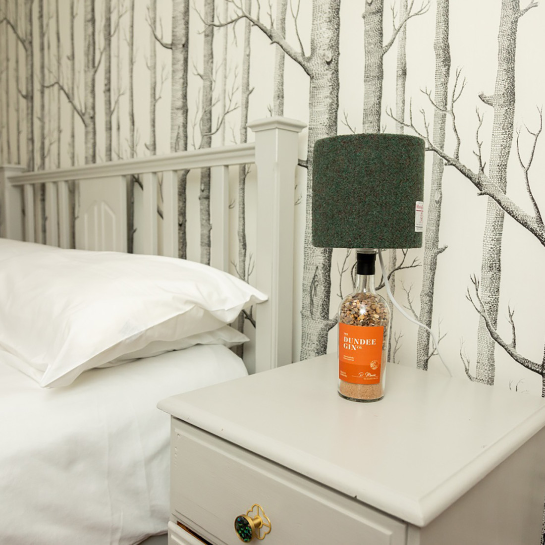 Harris Tweed lamp on bedside table