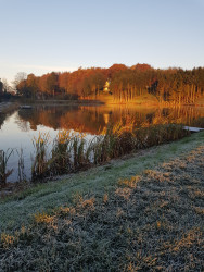 Sunrise view over fishing pond