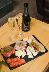 Charcuterie with Prosecco on table
