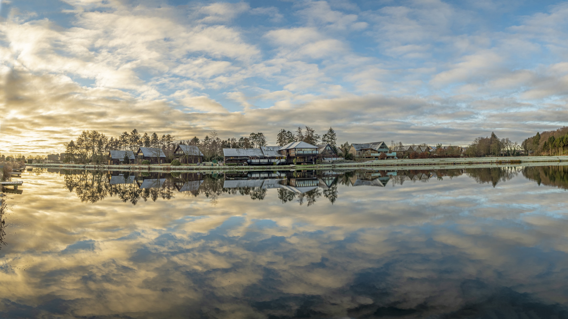 Cloud reflections on fishing pond