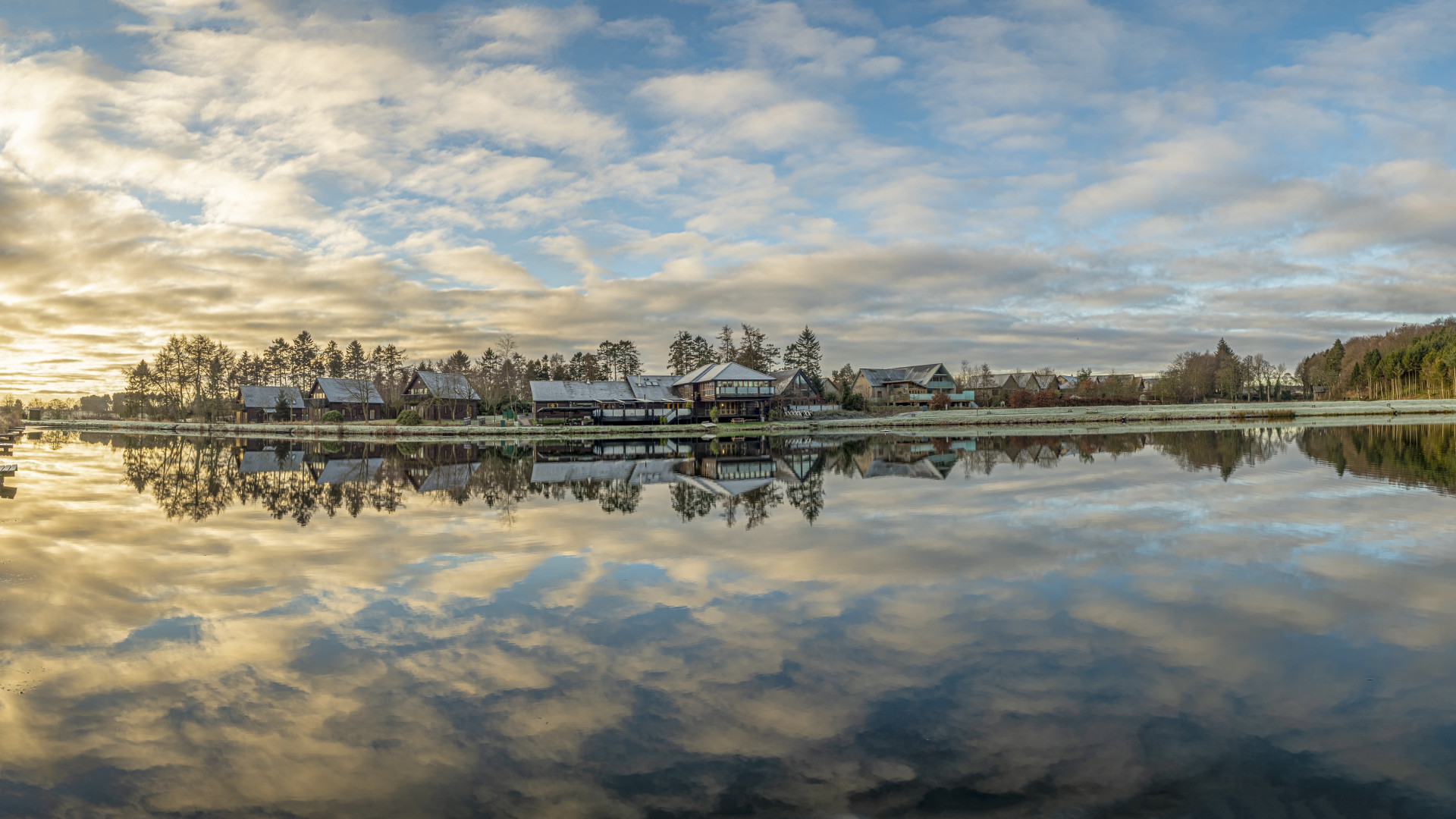 Cloud reflections on fishing pond