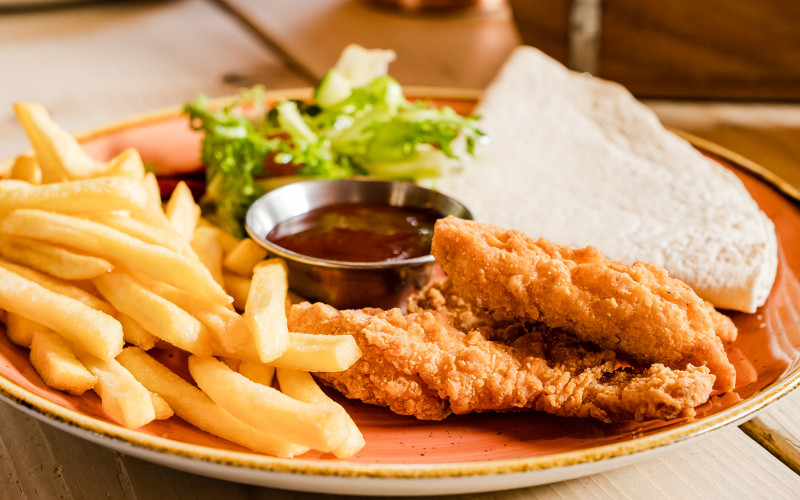 Chicken goujons, wrap and chips