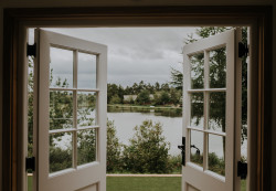 Views across fishing pond from shepherds hut
