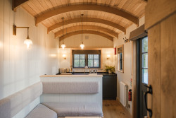 Kitchen and seating in shepherds hut