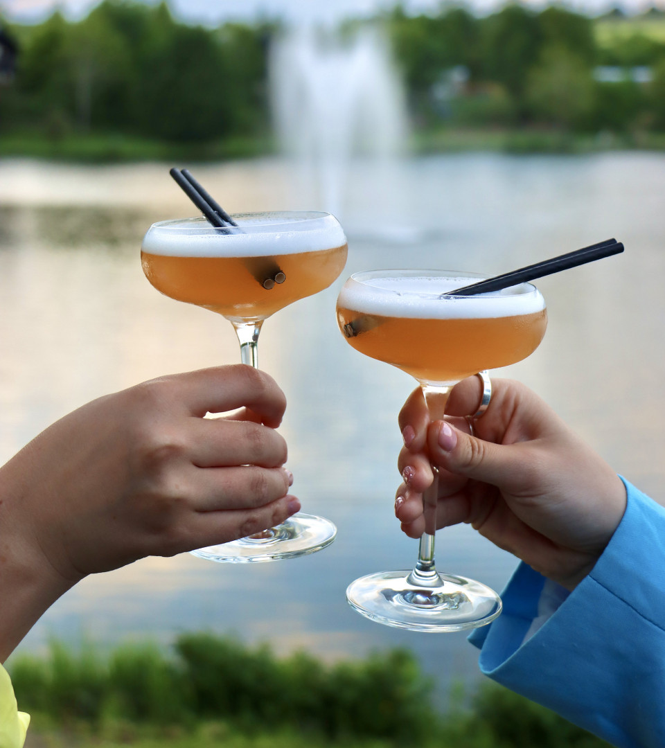 Cocktails on waterfront decking