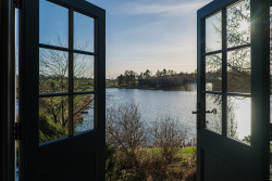 View from shepherds hut across fishing pond