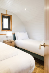 Twin beds in The Burrow